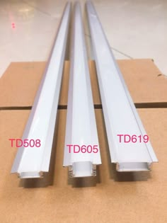 three different sizes and colors of t5 tubes