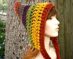 a mannequin wearing a multicolored knitted hat