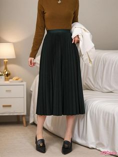 Qteee - Simplistic High-Waisted Pleated Skirt: Elegant and Versatile Midi Skirt Non-stretch Green Winter Skirt, Non-stretch Green Skirt For Winter, Casual Knee-length Stretch Pleated Skirt, Casual Stretch Knee-length Pleated Skirt, Winter Green Non-stretch Skirt, Winter Non-stretch Green Skirt, Stretch Solid Color Winter Skirt, Winter Stretch Solid Color Skirt, Winter Stretch Skirt In Solid Color