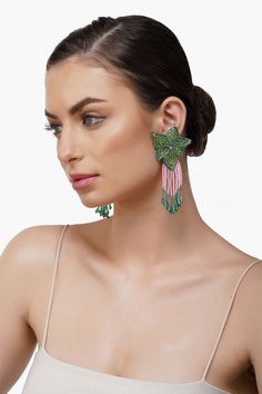 Beaded Handmade Earring in a Flower Shape with Drop Beads Hanging Attached with center back Pin Hand crafted in Green and Light Pink Colour Beads. Adorn yourself with the elegance of nature's beauty with our Flower Tassel Drop Earrings. These exquisite handcrafted earrings take on the form of delicate flowers, featuring a captivating design with drop beads that dangle gracefully, resembling nature's own petals. They are thoughtfully attached with a center back pin, ensuring a secure and comforta Green Flower-shaped Beaded Earrings With Dangling Beads, Elegant Flower Earrings With Colorful Beads, Elegant Multicolor Beaded Flower Earrings, Handmade Earring, Tassel Drop Earrings, Delicate Flowers, Light Pink Color, Drop Beads, Pink Beads