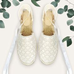 Flat espadrilles adorned with delicate lace that provide a sophisticated and feminine style, perfect for a special occasion. The ribbons add a charming and versatile detail, allowing for a perfect and secure fit around the ankle. Craftsmanship: Each pair of espadrilles is hand-sewn with meticulous care, reflecting authentic artisanal work that guarantees quality and attention to detail. Product Details: Outer Material: High Quality Lace Sole: Jute and non-slip natural rubber Closure: Adjustable Summer Lace-up Sandals For Wedding, Elegant Lace-up Sandals For Beach, Lace-up Sandals For Summer Wedding, Elegant Summer Espadrilles With Round Toe, Elegant Lace-up Sandals For Beach In Spring, Elegant Cream Espadrilles With Round Toe, Elegant Espadrilles With Woven Sole And Flat Heel, Elegant Espadrilles With Woven Sole, Elegant Closed Toe Lace-up Beach Sandals