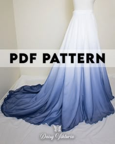 a white and blue dress on display with the text, free pattern for this gown