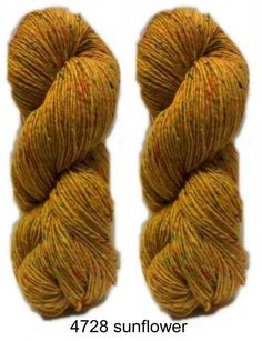 two skeins of yarn are shown with the same color as each one in yellow