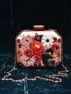 This is one of a kind handcrafted bag which is hand-embroidered to order. As it is a handcrafted product, it may have slight irregularities or imperfections.  MEASUREMENTS Length - 17.78cm Width - 17.78cm Handle - 116.84cm This clutch can be worn as a crossbody bag or a shoulder bag with the sling chain or can simply be carried in hand. It is spacious enough to carry mobile phones, cosmetics, keys and other small accessories. It's a beautiful ornamented piece to carry to weddings, parties and other formal events. Rectangular Bag With Multicolor Embroidery And Hand-stitched Details, Embellished Bags As Gifts, Hand-stitched Rectangular Bag With Multicolor Embroidery, Embroidered Rectangular Clutch For Festivals, Elegant Embroidered Square Shoulder Bag, Bohemian Embellished Shoulder Bag For Gift, Bohemian Embellished Shoulder Bag As Gift, Elegant Square Embroidered Shoulder Bag, Pink Rectangular Shoulder Bag With Handwork