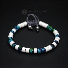 "top jewelry gifts for men and women, gifts for boyfriend, unique gifts ideasHandmade bracelet made with 6mm white, blue and green ceramic Mykonos beads. It's adjustable, utilizing a sliding knot made with macrame cord and is easy to put on and take off by yourself. Ceramic beads are handmade and have unique splatter paint art with vibrant colors. Please choose one of the 2 size options (For Men or Women) from dropdown menu. Men`s Size : 7\"- 8.5\" (18 cm -21 cm) Women`s Size: 6\"-7.5\" (16 cm - Elegant White Friendship Bracelets With Colorful Beads, White Bracelets With 8mm Adjustable Beads, Adjustable White Braided Bracelet, White Friendship Bracelets With 8mm Beads As Gift, Handmade White Spiritual Friendship Bracelets, White Friendship Bracelets With 8mm Beads, White Hand-strung Bracelets With Round Beads, Minimalist White Bracelets With Colorful Beads, White Spiritual Friendship Bracelets With Colorful Beads