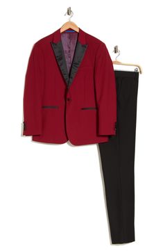 Bring understated elegance to the table in this three-piece tuxedo crafted from rich fabric in a classic single-breasted silhouette. Jacket has shawl collar; chest welt pocket; front welt pockets Vest has front button closure; V-neck Pants have zip fly with button closure; front slant pockets; back button-welt pockets Jacket and vest are lined; trousers are lined to the knee 65% polyester, 35% viscose Dry clean Imported Each suit has a 6” drop, meaning that a size 38R jacket is paired with size Elegant Winter Slim Fit Sets, Classic Red Suit For Evening, Fitted Sets With Notch Lapel For Black-tie Events, Elegant Red Suit, Elegant Formal Winter Sets, Elegant Formal Sets For Winter, Formal Tuxedo Sets With Notch Lapel, Classic Tailored Three-piece Suit For Party, Formal Tuxedo Sets With Slim Fit