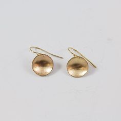 Match these with just about any outfit in your closet. One of our best sellers and one of the new jewelry staples of your wardrobe.  http://www.clpjewelry.com/new/concave-small-earrings  .  .  .  #clpjewelry #handmadejewelry #gold #earrings #goldearrings #jewelry #denverjewelry #303style #dangles #shop303 #shopdenver Minimalist Rounded Earrings For Gift, Minimalist Rounded Earrings For Gifts, Gold Rounded Earrings For Everyday, Yellow Gold Earrings Gift, Yellow Gold Rounded Earrings For Gift, Yellow Gold Round Linear Earrings With Ear Wire, Adjustable Brass Round Disc Jewelry, Yellow Gold Linear Earrings For Everyday, Yellow Gold Round Linear Earrings For Everyday