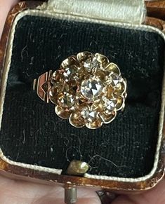 *SUPER COOL*  HANDMADE & UNIQUE Antique Early Victorian 14k Gold Rose Cut Diamond Ring from Amsterdam Estimated circa Approx. 1850 No hallmarks~ but tested 14k  15mm across the top of the ring Size 8 easily resizable within reason ( 2 sizes either way)  7 Prong set Dutch Rose Cut Diamonds all open backed  Impossible to give accurate Carat weight to the diamonds but approx .68ct. total weight Center diamond approx.3.8mm .20ct. The other 6 dutch cut diamonds ranging from approx. 3.5 to 2.9mm avera Antique Rose Gold Jewelry With Single Cut Diamonds, Victorian Gold Cluster Diamond Ring, Victorian Style Gold Cluster Diamond Ring, Antique Gold Cluster Ring For Wedding, Victorian Diamond Cut Diamond Ring Gift, Victorian Yellow Gold Cluster Ring Gift, Victorian Rose Cut Diamond Cluster Ring Gift, Victorian Style Yellow Gold Cluster Ring Gift, Victorian Style Yellow Gold Cluster Ring As Gift