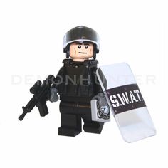 Lego Custom The Walking Dead Glenn Rhee with riot police gear and custom weapon on Etsy, £14.99 Walking Dead Glenn, Lego Swat, Lego Music, Police Light, Army Toys, Walking Dead Rick Grimes, Abraham Ford, Six Shooter