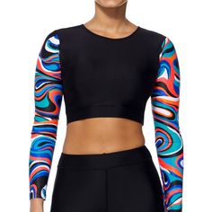 Reebok's Cropped Rash Guard Features A Crewneck And Long Sleeves For Sun And Surf Protection. Imported Crewneck; Cropped Hem; Swirl-Print Sleeves Lined Pullover Styling; Long Sleeves Condition: Brand New With Tags Never Washed Worn Or Owned. Category: Apparel & Accessories > Clothing Manufacturer: Reebok Size: Us Women's Small Color: Multicolor Shipping: Arrives In 3 To 4 Business Days Via Usps First Class. Priority Shipping Is Available At Checkout. All Orders Ship Out Within 24 Hours. We Offer Fitted Color Block Tops For Streetwear, Black Sporty Swimming Activewear, Fitted Moisture-wicking Tops For Streetwear, Moisture-wicking Fitted Tops For Streetwear, Fitted Color Block Athleisure Tops, Fitted Sportswear Tops For Winter, Fitted Black Color Block Tops, Winter Workout Activewear With Graphic Print, Fitted Winter Sportswear Tops