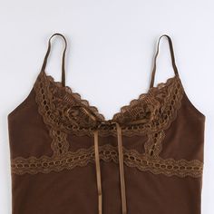 Nina Lace Trim Camisole The Nina Lace Trim Camisole by Alees Fashion is a perfect blend of elegance and comfort. Featuring delicate lace trims and a charming bow accent, this camisole adds a touch of sophistication to any outfit. The rich chocolate brown color enhances its luxurious appeal, making it ideal for layering or wearing on its own. Crafted from high-quality materials, it ensures a soft and comfortable fit for daily wear. Details - Material: High-quality fabric with lace trims- Color: C Chic Camisole With Contrast Lace, Sleeveless Lace Camisole With Lace Patchwork, Lace Patchwork Camisole Tank Top, Elegant Lace Tank Top With Straps, Sleeveless Summer Camisole With Contrast Lace, Sleeveless Camisole With Contrast Lace For Summer, Summer Sleeveless Camisole With Contrast Lace, Spring Camisole With Contrast Lace And Spaghetti Straps, Spring Camisole With Spaghetti Straps And Contrast Lace