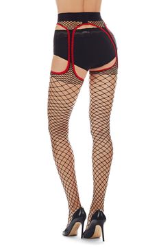 A modern take on the classic fishnet, these suspender tights feature bold cutouts for an alluring look. Nylon/spandex Hand wash, dry flat Imported High Stretch Mesh Fishnet Bottoms, High Stretch Fishnet Mesh Tights, Edgy Mesh Fishnet Tights, Edgy Fishnet Mesh Tights, Fitted Fishnet Nylon Tights, Black Fishnet Mesh Tights, Black Fishnet Mesh Hosiery, Fitted Thigh-high Net Stockings, Fitted Fishnet Nylon Legwear