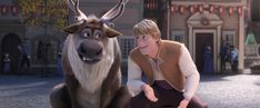 an animated character is sitting next to a reindeer