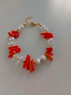 Pearl bead and orange coral bracelet is a nice christmas gift,Valentine's day gift,birthday gift,wedding gift,bridesmaid gift and other special day gift for lovelies. Orange coral jewelry Handmade, carefully crafted with passion. *Friendship bracelet is Very simple and stylish, *Made to order, *Summer accessories comes packaged in a tulle sachet. Coral Bracelet Jewelry For Beach, Orange Beaded Bangle Bracelet As Gift, Coral Beach Bracelet Jewelry, Coral Colored Beach Bracelet, Adjustable Coral Bracelets As A Gift, Adjustable Red Coral Beaded Bracelets As Gift, Hand-strung Orange Bracelets For Beach, Coral Bracelets With Colorful Beads For Beach, Beach Bracelets With Colorful Beads In Coral