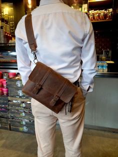 Cheap Rectangular Men's Bags, Modern Mobile Phone Satchel Chest Bag, Modern Large Capacity Leather Chest Bag, Modern Large Capacity Crossbody Saddle Bag, Business Shoulder Belt Bag, Modern Leather Belt Bag With Large Capacity, Modern Large Capacity Shoulder Belt Bag, Modern Brown Crossbody Camera Bag, Modern Crossbody Shoulder Bag For Everyday