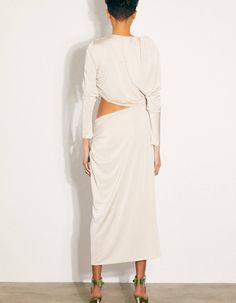 Draped jersey dress with a cut-out. Fits true to size designed for a close fit mid-weight, stretchy fabric FabricJersey: %97 PES %3 EASize Chart SIZE SHOULDER CM BUST CM WAIST CM HIP CM SLEEVE LENGTH CM 34 37 84 64 93 57 36 38 88 68 97 58 38 39 92 72 101 59 40 40 96 76 105 60 42 41 100 80 109 61 44 42 104 84 113 62