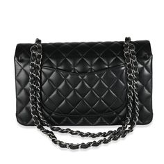 A timeless classic that never goes out of style, the flap bag from Chanel dates back to 1955 and has seen a number of updates. The design was revolutionary for its time, giving its wearers the freedom to carry their everyday must-haves without the cumbersome nature of a larger bag. The bag features the classic leather-entwined chain-link shoulder strap for a distinctive aesthetic. Item #: 139222 MSRP: 10,200 Size: Medium Circa: 2021-2023 Condition: Very Good Includes: Box;Dustbag;Receipt;Care Booklet;Retail Tag Exterior Color: Black Strap Length: 9-17 Made in: France Dimensions: 10 x 6 x 2.5 Exterior Material: Leather Balenciaga Backpack, Hermes Bags, Black Quilt, Chanel Black, The Freedom, Large Bag, Classic Leather, Fendi Bags, Flap Bag