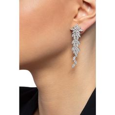 These exquisite 18k White Gold Ghirlanda Classics Earrings with Diamonds from Pasquale Bruni will take your breath away. The delicate garland design, gracefully wrapping around your earlobe, is studded with brilliant diamonds that glimmer in the light, adding a touch of sparkle to any outfit. These earrings are the perfect accessory for any occasion, whether you're dressing up for a night out or adding a touch of elegance to your everyday look. The craftsmanship and attention to detail are evide Luxury Dazzling Diamond Earrings With Accents, Elegant Diamond Linear Earrings For Parties, Elegant Diamond Cut Linear Earrings For Formal Occasions, Elegant Linear Diamond Cut Earrings For Formal Occasions, Elegant Linear Earrings With Brilliant Cut For Wedding, Elegant Formal Bridal Earrings With Diamond Cut, Elegant Diamond White Linear Earrings, Elegant Brilliant Cut Linear Earrings For Wedding, Formal Single Cubic Zirconia Diamond Earring