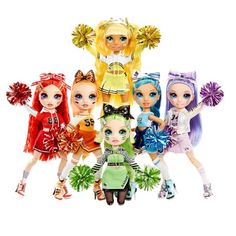 a group of dolls standing next to each other in front of a white background,