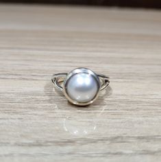 White Moti Ring Design In Silver, Silver Pearl Ring For Anniversary, Round Band, Silver Pearl Ring For Anniversary With Round Band, Anniversary Silver Pearl Ring With Round Band, Silver Sterling Pearl Ring, White Sterling Silver Pearl Ring, White Pearl Sterling Silver Ring, Fine Jewelry White Pearl Ring In Sterling Silver, Silver Sterling Silver Pearl Ring With Polished Finish