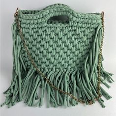 Pastel Green Large Fringe Crochet Bag Condition: Brand New! Handmade Item- Handwoven This Bag Is 100% Hand Knit. Color: Mint Green Metal: Muted Gold Dimensions: Purse 8" L X 13" W Fringe: 6.5"L Total Length: 28." Style: Boho Chic/ Edgy Chic/ Hippie Chic/ Trendy This Bag Was Designed And Produced By Us. Crochet Crossbody Bag With Braided Handles For Shopping, Green Crochet Top Handle Bag With Braided Handles, Trendy Crochet Bag With Leather Top Handle, Green Crochet Top Handle Bag, Fringe Crochet, Bling Party, Handwoven Bag, Red Leather Bag, Handmade Purse