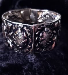 This pretty vintage cuff bracelet is not marked, but it has what looks like SG or SC (Sarah Coventry)scrolled into design by hinge. It has a pretty vintage style patina possibly silver plate as it has not tarnished. It has a dark antiquing that's mostly in recessed areas of the design. This bracelet is 1 3/8 inches thick. It closes completely on a size 7 wrist, and moves around slightly. The condition is great. We ship USPS, usually the next day. Our shop combines shipping and a shipping discoun Vintage Cuff Bracelet, Pressed Metal, Blue Milk, Wrist Jewelry, 21st Gifts, Sarah Coventry, Sunflower Design, Cuff Bangles, Coventry