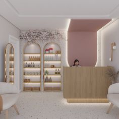 a woman sitting behind a counter in a room with white chairs and shelves filled with bottles