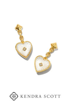 Is there anything cuter than dainty hearts? With the Adalynn 18k Gold Vermeil Heart Drop Earrings in Ivory Mother-of-Pearl, we think not. Carved lines branch out from a white sapphire center, creating a bursting heart design that’s sure to turn heads. Dainty yet full of detail, these quality drop earrings are totally crush-worthy. Pearl Drop Earring, White Dainty Earrings With Heart Charm, White Mother Of Pearl Earrings, Elegant White Pierced Heart Earrings, White Heart-shaped Pearl Charm Earrings, Elegant White Heart Earrings With Heart Charm, White Pierced Heart Earrings For Valentine's Day, Valentine's Day White Pearl Drop Heart Earrings, Valentine's Day White Heart Earrings With Pearl Drop