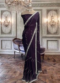 Beautiful deep purple satin georgette saree with mirror work and running blouse piece. Elegant Purple Pre-draped Saree, Purple Embellished Pre-draped Saree, Embellished Purple Pre-draped Saree, Purple Embellished Georgette Pre-draped Saree, Purple Pre-draped Saree With Cutdana For Party, Purple Georgette Pre-draped Saree For Festivals, Purple Georgette Pre-draped Saree For Evening, Purple Silk Pre-draped Saree For Party, Purple Silk Pre-draped Saree For Reception