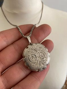 It is a English hallmarked, vintage, round, ornate, locket/pendant, with a silver chain, there is a silver hallmark on the clasp, weight 23 g, pendant height 4.2 cm, 3.2 cm diameter, chain is 55 cm long, in a good condition. Art Deco Watch, Gold Horse, Silver Locket, Cabochon Ring, Silver Lockets, Gold Top, Banded Agate, Vintage Band, Locket Necklace