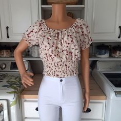 100% Polyester Material Off Or On Shoulders Puff Sleeves Blouse. Apricot Background Color With Light And Dark Shades Of Burgundy Floral Print Flowers. Beige Smock Tops For Summer, Casual Beige Blouse With Smocked Bodice, Fitted Casual Peasant Top With Short Sleeves, Beige Tops With Smocked Back For Day Out, Beige Top With Smocked Back For Day Out, Stretch Smocked Puff Sleeve Blouse, Casual Floral Print Cropped Smocked Top, Casual Cropped Floral Smocked Top, Casual Cropped Smocked Top With Floral Print