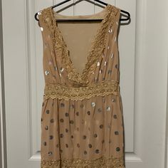 Tan Sleeveless Long Dress, Size Small With Lace And Silver Dots. Lining Underneath Goes About Mid Calf. Zipper On Side Under Arm As Shown In Pic. This Is A Size Small Never Worn, New W/O Tags. Beige Sleeveless Mini Dress With Sequins, Sleeveless Beige Mini Dress With Sequins, Beige Sleeveless Sequin Mini Dress, Beige Sequined Sleeveless Mini Dress, Beige Sleeveless Dress For Night Out, Beige Sleeveless Dresses For Night Out, Sleeveless Beige Dresses For Night Out, Summer Sleeveless V-neck Sequin Dress, Sleeveless V-neck Sequin Summer Dress