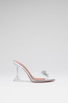 Elegant Cocktail Heels With Clear Strap, Glamorous Clear Heels With Clear Strap, Elegant Heels With Clear Strap For Cocktail, Clear Heels With Clear Strap For Evening, Glamorous Clear Heels For Cocktail, Chic Clear Heels For Formal Occasions, Luxury Heels With Clear Strap For Formal Occasions, Elegant Clear Heels With Round Toe, Elegant Clear Heels With Sculpted Heel