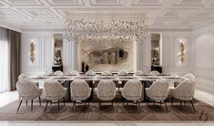 an elegant dining room with white chairs and chandelier