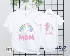 Looking for that Birthday shirt either for a party or as a gift? Look no further than the Bella +Canvas Birthday shirts with our unique design, perfect for your unicorn birthday party theme  The Adult Shirts are the Bella Canvas Unisex premium t-shirt which feel soft, and light with just the right amount of stretch. This is complimented by the Baby Shirt, the Bella Canvas One Piece which is great for the little a baby's comfort. This one piece is the right choice for all active babies. The envelope neckline and three snap leg closure ensure comfort throughout the day. For the slightly older little one, the Toddler Bella Canvas Tee with its light and soft ring-spun cotton is just what's needed for the ever-moving toddlers!  The Youth Staple Bella Canvas Tee completes the set for the for the White Unicorn Print T-shirt For Summer, Summer White T-shirt With Unicorn Print, Cute White T-shirt With Unicorn Print, White Unicorn Print T-shirt For Birthday, Birthday White T-shirt With Unicorn Print, White Unicorn Print Top For Birthday, White T-shirt With Unicorn Print For Birthday, Cotton Unicorn Print Top For Birthday, Fun Unicorn Print Tops For Birthday