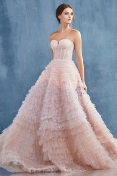 STRAPLESS FAUX LACE CORSET WITH A RUFFLED OMBRE BALLGOWN. BACK ZIPPER CLOSURE, SOME STRETCH. Model is 5'8" wearing a size 4 Blush Evening Gown, Delicate Wedding Dress, Ombre Skirt, Andrea And Leo, Ruffled Gown, Corset Gown, Strapless Sweetheart Neckline, Lace Corset, Ruffle Skirt