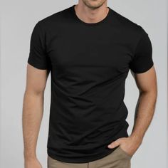 Bylt Basics Drop-Cut: Bylt Blend Color: Black Size: Large Product Description Take Your Everyday, On-The-Go Look To A New Level With A Shirt That Brings You Comfort In Any Setting. The Bylt Blend Fabric Is The Epitome Of Soft With A Naturally Performance Wicking Quality Delivering The Utmost In Premium Casual Comfort. Product Features Ultra-Soft Level Of Comfort Loose-Knit Casual Drape For Mobility Non-Shrink Wrinkle-Free No-Flip Hemline 4-Way Ultra-Stretch Richer Color Saturation Clean-Fit Coll Black Plain Summer Shirt, Black Fitted Crew Neck Shirt, Classic Black Stretch Shirt, Casual Black Plain Shirt, Black Stretch Plain Tops, Black Stretch Plain T-shirt, Fitted Plain Black T-shirt, Classic Plain Black Shirt, Classic Black Plain Shirt