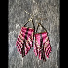 Handwoven Miyuki delica seed beads stitched onto a brass triangle finding in gold. Original boho fringe design. Each earring is woven with matte hot pink, luster amber, and currant beads.  Measures around 2.5 inches in drop length and 1 inch wide and has hypoallergenic (nickel and lead free) alloy ear hooks in gold. For best care, store earrings flat or hanging when not wearing to retain shape of beadwork.  **These earrings are a part of my Triangle Line Fringe Series, and each piece is designed and handmade with love.** Fringe Series, Store Earrings, Pink Triangle, Pink Flats, Boho Fringe, Jasper Earrings, Pumpkin Earrings, Bead Stitching, Original Jewelry