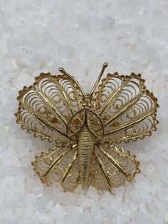 Just gorgeous: a 14K gold butterfly brooch/ pendant. The Pendant, circa 1950s, weighs 5.92 grams. Elegant Gold Butterfly Ring For Formal Occasions, Elegant Butterfly Brooch For Collectors, Elegant Butterfly Brooches For Collectors, Elegant Collectible Butterfly Brooches, Elegant Butterfly Brooch, Elegant Collectible Butterfly Jewelry, Elegant Yellow Gold Butterfly Ring, Gold Butterfly Brooches For Collectors, Vintage Gold Butterfly Ring Gift