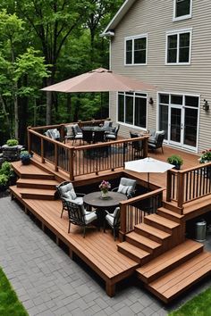 a deck with chairs and an umbrella over it