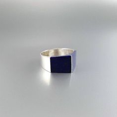 Triangle statement ring Lapis Lazuli and Sterling silver inlay work. Unique gift for her or him, friend, girlfriend, boyfriend, September and December birthstone, 9 year anniversary. Extraordinary design and modern timeless beauty, a true eye catcher. This beautiful ring is worked with the technique of inlay, which means the stone is worked seamlessly into the Sterling silver. All our inlay work is real stone, not ceramic stone dust. All our stones are natural stones and slight differences in si Modern 925 Stamped Jewelry As Gift, Modern 925 Stamped Jewelry For Gift, Minimalist Blue Jewelry For Everyday, Modern Lapis Lazuli Jewelry With Polished Finish, Pyramid-shaped Sterling Silver Jewelry Gifts, Sterling Silver Pyramid Jewelry As Gift, Sterling Silver Pyramid Jewelry For Gifts, Handmade Sapphire Minimalist Jewelry, Handmade Minimalist Sapphire Jewelry