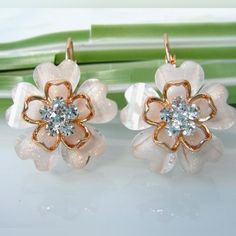 The Cute Earrings,Blooming Flowers, Metal Petals And Crystal Flower Core, Give A Person A Kind Of Delicate And Noble Feeling.The Best Gift For Yourself Or Relatives And Friends Size:2.0cm X 3.2cm (1.0inch=2.54cm) 1 Pairs 8 Grams Wrapping: Gift Box,Wipe Cloth,Yarm Bag White Feminine Flower Earrings For Formal Occasions, White Flower Earrings With Ear Wire For Party, White Feminine Flower Earrings For Anniversary, Feminine White Flower Earrings For Anniversary, Flower Core, Vintage Drop Earrings, Boys Jewelry, Kate Spade Earrings, White Crystals