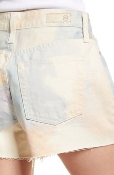 A cloudy design in pastel hues brings dreamy vibes to these high-waist nonstetch shorts punctuated with raw hems. 3 1/2" inseam, 13" leg opening, 11 1/2" front rise, 15" back rise (size 29) 100% cotton Machine wash, tumble dry Imported Faded High Waist Spring Shorts, Spring Tie Dye Bleached Bottoms, Faded Cotton Shorts For Spring, Spring Cotton Faded Shorts, Spring Faded Cotton Shorts, Faded High-waisted Shorts For Spring, Spring Faded High-waisted Shorts, Relaxed Fit Faded Shorts For Spring, Spring Tie-dye Bottoms In Short Length