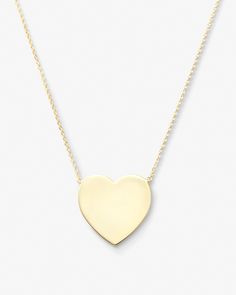 Make a grand gesture of love with our XL You Have My Heart Necklace, a captivating large heart pendant necklace that speaks volumes. This big heart necklace is more than an accessory; it's an expression of deep affection and timeless style. The meticulously crafted large heart necklace serves as a statement piece, symbolizing love in a bold and elegant manner. It makes for a thoughtful gift idea, capturing the sentiment of the heart. With Melinda Maria, you're not just buying jewelry; you're inv Big Heart Necklace, Melinda Maria Jewelry, Melinda Maria, Amulet Necklace, Large Heart, Gold Heart Necklace, Demi Fine Jewelry, Handcrafted Necklace, Black Necklace