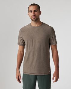 The Strato Tech Tee is the softest piece of workout apparel on the planet, doubling as your go-to t-shirt. With next-level comfort, our softest performance knit is quick drying and moisture wicking. | Vuori Strato Tech T-Shirt / Tee | Greige Heather | 3XL Vuori makes premium performance apparel inspired by the active Coastal California lifestyle; an integration of fitness, surf, sport, and art. Breaking down the boundaries of traditional activewear, we are a new perspective on performance appare Relaxed Fit Short Sleeve Tops In Recycled Polyester, Recycled Polyester Short Sleeve Athleisure Activewear, Athleisure Activewear With Short Sleeves In Recycled Polyester, Athleisure Short Sleeve Activewear In Recycled Polyester, Short Sleeve Athleisure Activewear In Recycled Polyester, Sporty Short Sleeve Tops In Recycled Polyester, Athleisure Short Sleeve Tops In Recycled Polyester, Casual Short Sleeve Tops In Recycled Polyester, Short Sleeve Recycled Polyester Activewear For Workout