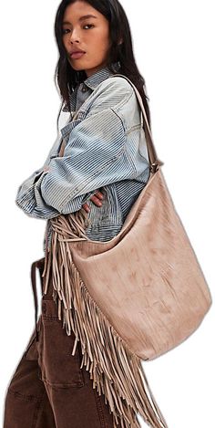 Chic Travel Bag With Fringe, Chic Brown Fringe Hobo Bag, Chic Beige Fringe Shoulder Bag, Chic Fringe Hobo Bag For Travel, Chic Travel Hobo Bag With Fringe, Chic Travel Bucket Bag With Fringe, Chic Beige Fringe Bag, Chic Fringe Shoulder Bag For Travel, Chic Brown Hobo Bag With Tassels