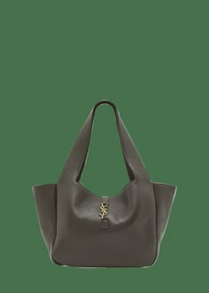 "Find SAINT LAURENT Bea Cabas Ysl Tote Bag In Supple Leather on Editorialist. Saint Laurent \"Bea\" supple cabas shoulder bag in deer leather Flat shoulder straps Center YSL logo strap closure Interior, one zip pocket Approx. 19.7\"H x 11\"W x 7.1\"D Professional cleaning recommended Made in Italy" Elsa Style, Ysl Tote Bag, Ysl Tote, Ysl Logo, Family Event, Bag Light, Professional Cleaning, Black Bag, Lookbook Outfits