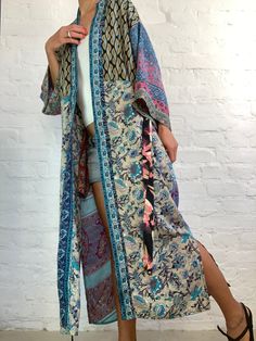 "This is free size patchwork robe made in vintage saree silk maxi long cover up with side splits and easy wrap tie closing perfect comfy daily duster with pockets can be worn on its own or layered over jeans and t shirt made free size length 55\" Thank You for looking" Bohemian Robe With Patchwork And Kimono Sleeves, Bohemian Multicolor Patchwork Robe, Beach Kimono With Patchwork Sleeves, Multicolor Wrap Kimono With Patchwork, Multicolor Patchwork Wrap Kimono, Spring Bohemian Patchwork Robe, Bohemian Patchwork Robe For Spring, Bohemian Long Sleeve Patchwork Robe, Patchwork Long Sleeve Kimono For The Beach