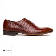 Caporicci 2543 Dark Gold Brown Alligator Leather Oxford Retail $2799.00 Made In Italy Color/Material: Dark Gold Brown Alligator Lace-Up Closure Lightly Padded Leather Insole Smooth Leather Sole 1 Inch Heel I Do Have Other Sizes (7.5-16) Just Ask Me. Clearing House. *Box’s Is Kind-Of Beat Up. Caporicci 1208 Genuine Alligator Apron Toe Penny Loafers Dark Gold Brown Beautiful Genuine Alligator Apron Toe Penny Loafers, Featuring Fine Stitch Detailing And Leather Sole. Caporicci Exotic Shoes Exemplif Brown Crocodile Pattern Oxfords For Formal Occasions, Brown Crocodile Pattern Formal Oxfords, Elegant Brown Crocodile Pattern Oxfords, Semi-formal Leather Oxfords With Crocodile Pattern, Formal Crocodile Pattern Cap Toe Dress Shoes, Formal Cap Toe Dress Shoes With Crocodile Pattern, Designer Crocodile Pattern Dress Shoes For Business, Leather Oxfords With Crocodile Pattern For Formal Occasions, Formal Leather Oxfords With Crocodile Pattern