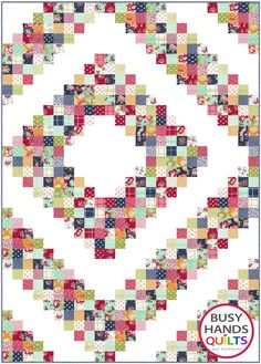 a colorful quilt is shown with the words busy hands quilts written in red, white and